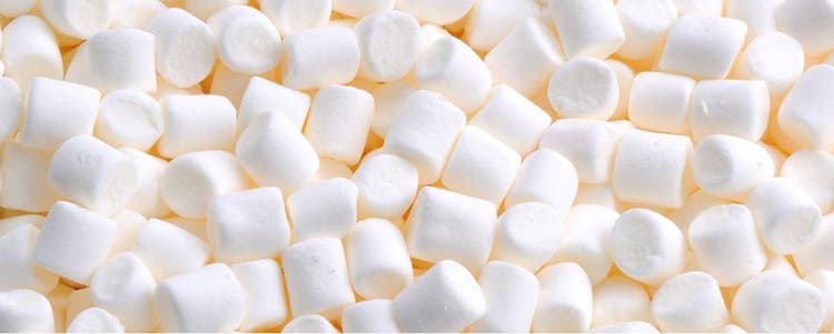 A pile of marshmallows, which can be harmful for dogs.