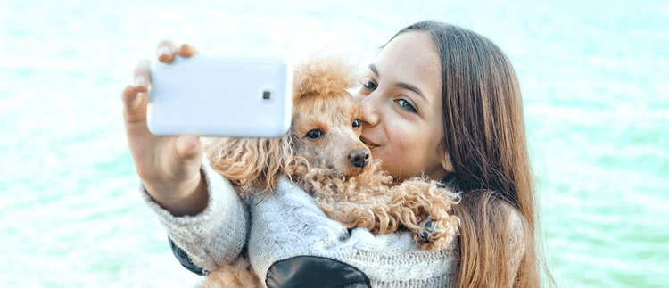 A woman takes a selfie with her