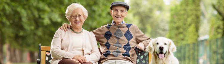 Two seniors with a pet.