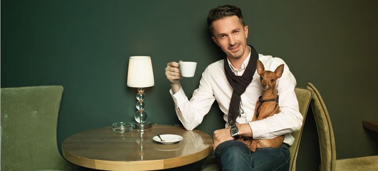 A dog enjoying a pet-friendly restaurant.